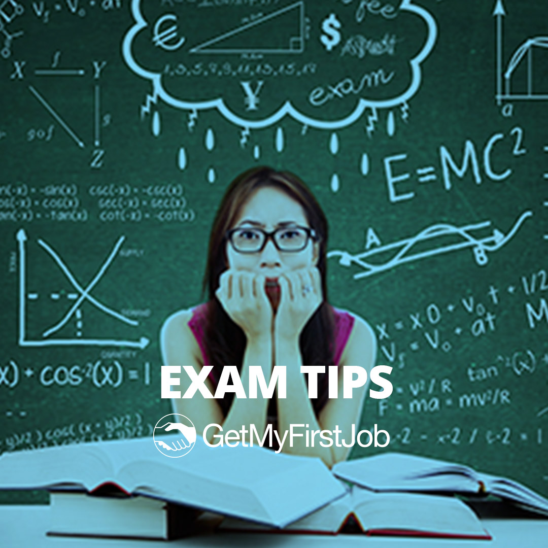 Girl in front of a whiteboard with calculations behind her