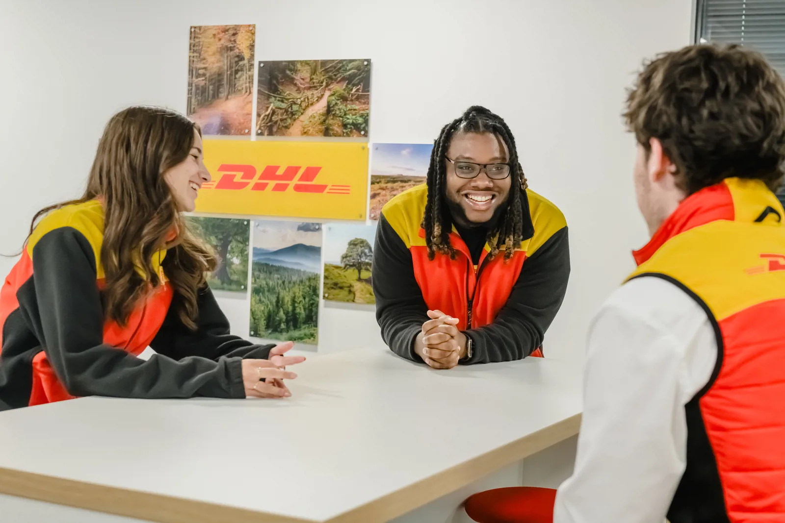 DHL employees at a desk